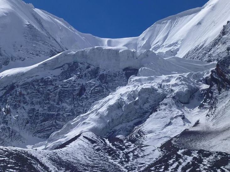 Snow and Ice on crossing Tharong La high pass on Annapurna circuit trek in the Nepal Himalaya