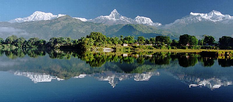 Annapurna South Peak, Macchapucchre ( Fishtail Mountain ) and Annapurna II from Phewa Tal in Pokhara