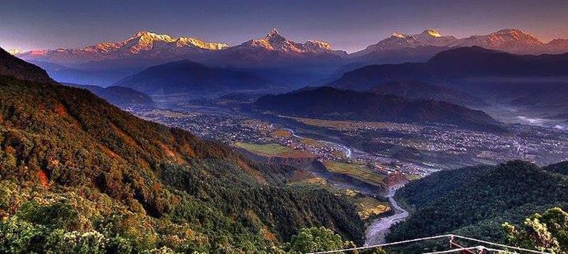 Annapurna South Peak, Macchapucchre ( Fishtail Mountain ) and Annapurna II from Phewa Tal in Pokhara