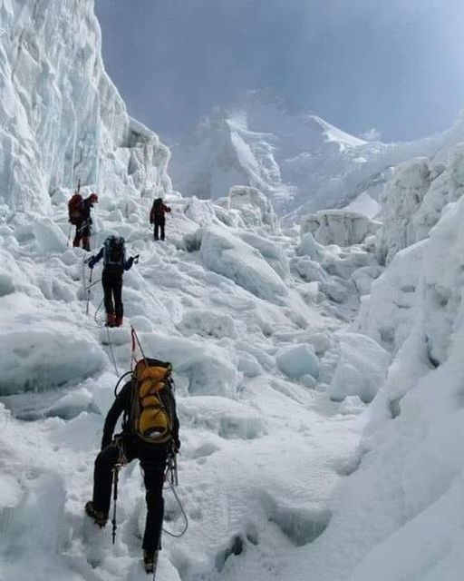 Climbers ascending the Khumbu Ice Fall on the South Col Route for Mount Everest