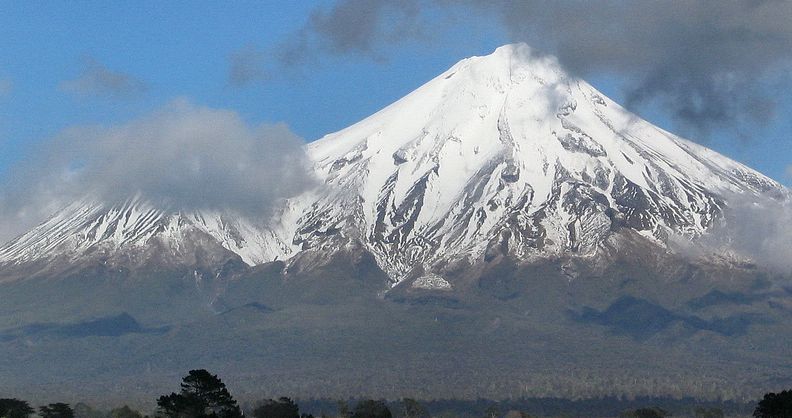 Photographs of snow-covered volcano Mount Egmont ( Taranaki ) in the ...