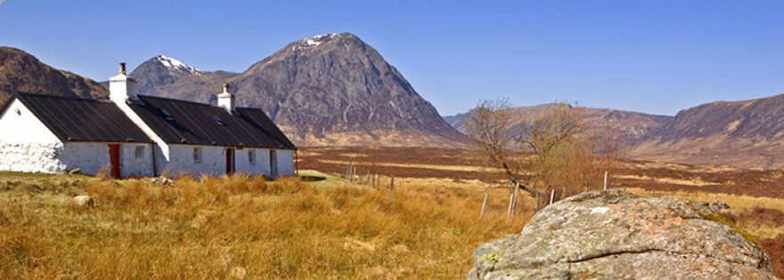 The West Highland Way - Black Rock Cottage and Buachaille Etive Mor in Glencoe in the Western Highlands of Scotland