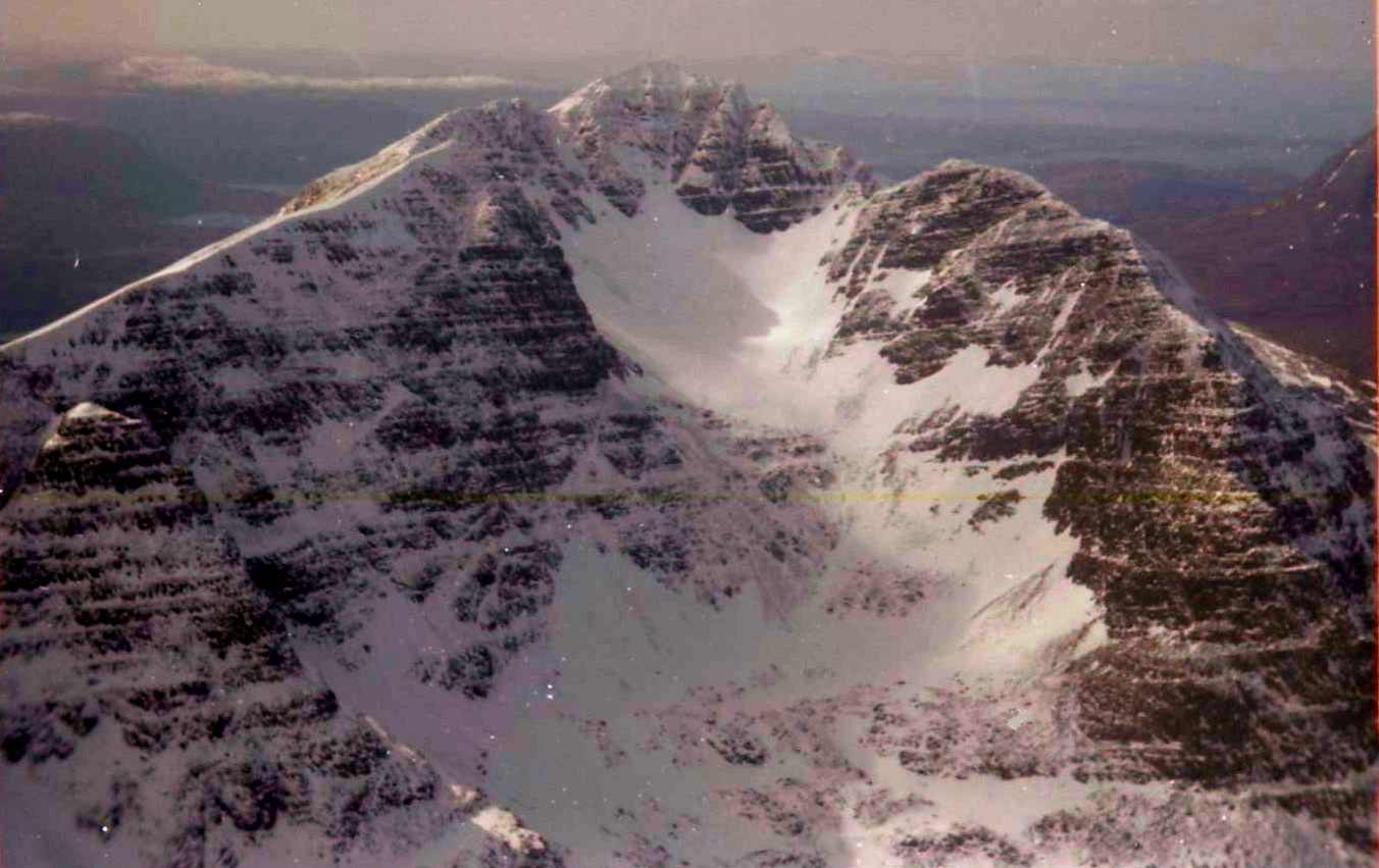 Snow-bound summit ridge of Liathach in winter in the Torridon Region of the NW Highlands of Scotland